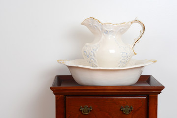 Closeup of an old wash basin and jug