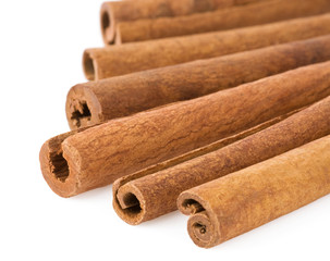 cinnamon sticks on white