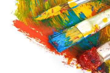 brush and color paints on white