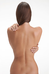 Fototapeta Back side view of a young,  woman's perfect body obraz