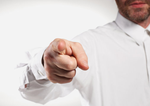 index finger into lens on white background