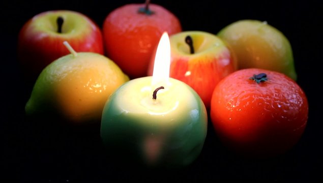 burning apple candle