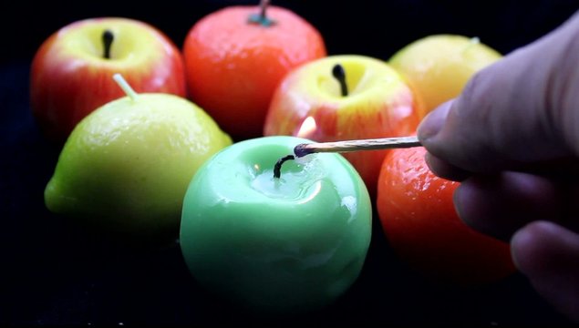 burning apple candle