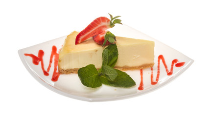 a piece of strawberry cheesecake on whit