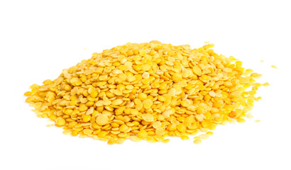 Yellow lentils isolated on white background. Macro shot