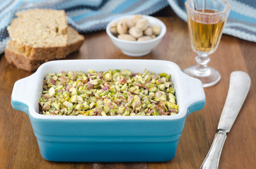 Chicken liver pate with pistachios close up horizontal
