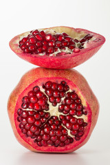 Fresh pomegranates cut open