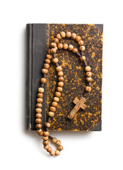 holy bible and rosary beads