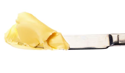 Gordijnen Butter on a knife © JPS