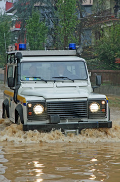 rescue car in a way flooded during a flood
