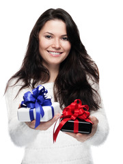 Young woman hands over two gifts - isolated