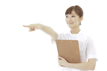 指を指す　医師または薬剤師又は研究員