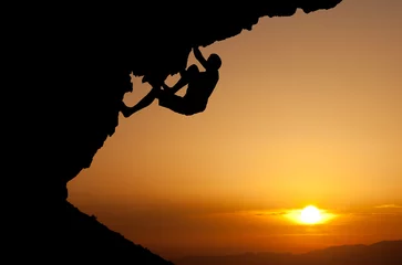 Gardinen silhouette of man climbing on overhanging rock © Alex Koch