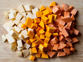 Chopped root vegetables on a chopping board