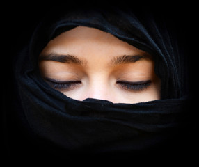 Portait of woman wearing scarf with eyes closed - 46830366