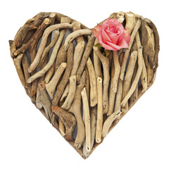 Hand-made ornamental heart made of dry sticks