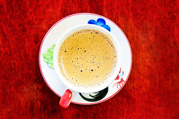 Coffee on redwood background