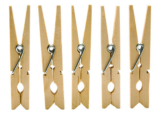 Wooden clothespins in a row