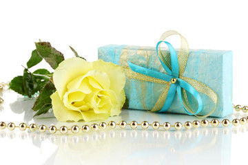 Beautiful yellow rose with wonderful gift in blue box isolated