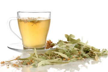 Glass cup of tea with linden isolated on white