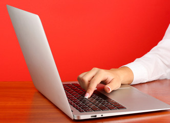 business woman's hands typing