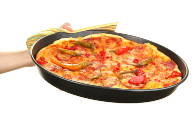 hand holding pepperoni pizza in pan isolated on white
