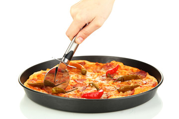 cutting tasty pepperoni pizza in pan isolated on white