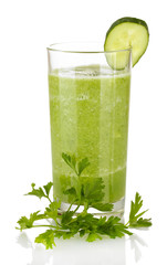 Green vegetable juice isolated on white