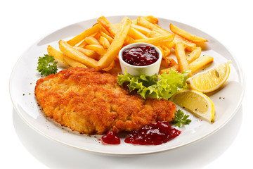 Pork chop, French fries and lingonberry