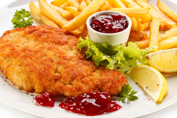 Pork chop, French fries and lingonberry
