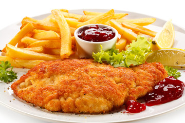 Pork chop, French fries and lingonberry