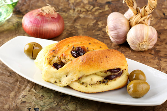 Bread seasoned with olive and oregano