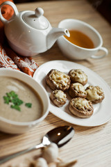 Portion of mushroom soup with tea