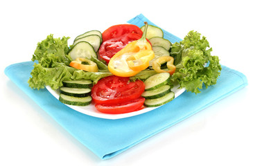 Chopped vegetables and sauce on plate isolated on white