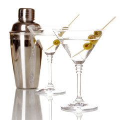 Martini glasses with olives and shaker isolated on white