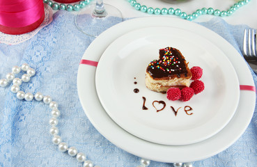 Plate with dessert in form of heart