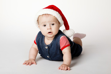 little cute baby with Santa costume