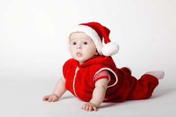 little cute baby with Santa costume