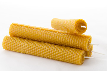 four beeswax candles