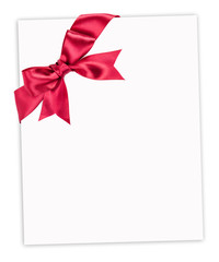 big red bow on paper sheet