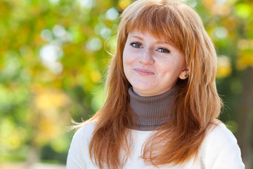 Fototapeta premium portrait of a beautiful young redhead teenager woman