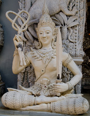 Ascetic with rope and blade statue in Traditional Thai style