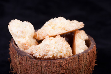 coconut cookies in black background