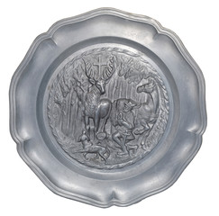 plate with a bas-relief of the hunters