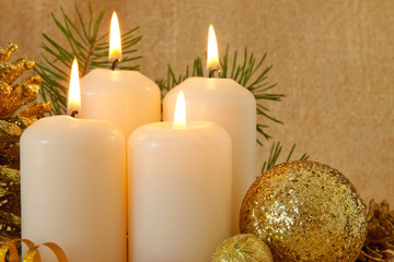 Obraz na płótnie Canvas Four advent candles and christmas decorations. 
