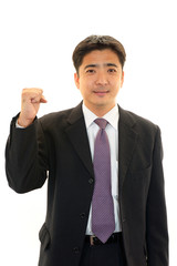 ガッツポーズのビジネスマン
