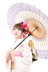 Beautiful kimono woman on white background