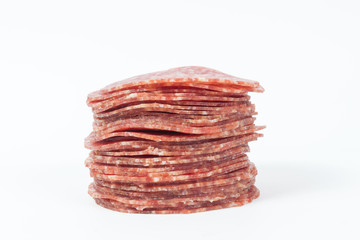 slices salami isolated on a white