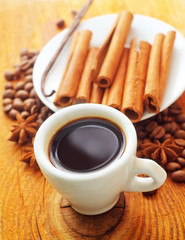 cinnamon and coffee on the white plate
