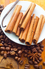 cinnamon and coffee on the white plate
